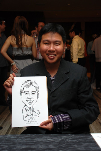 Caricature live sketching for Ezra Holdings 3