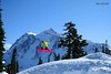 A snowboarder catches air at Mt. Baker