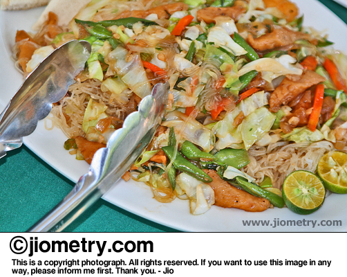 Tasty pancit bihon cooked by the attending restaurant staff