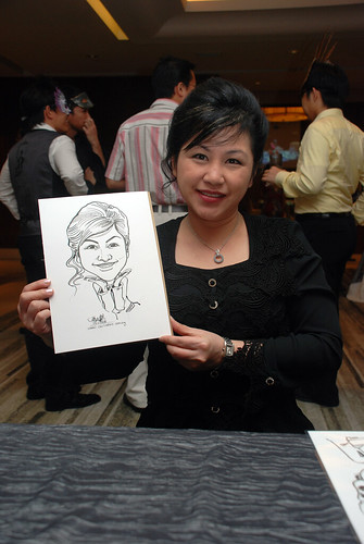 Caricature live sketching for Ezra Holdings 2