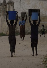 Mozambique Ladies Carrying Water