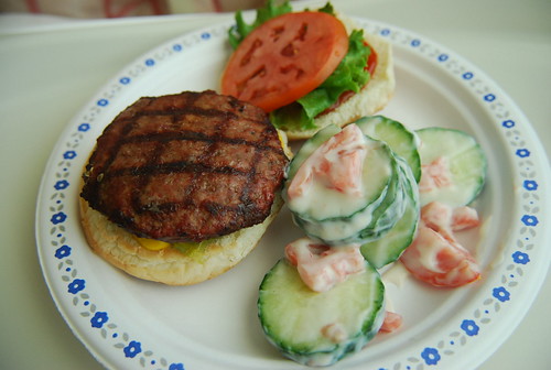 Burger and cucumber salad