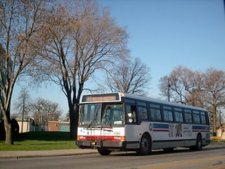Eastbound CTA Route # 77 Belmont Avenue bus departing the west terminal. River Grove Illinois. April 2007.