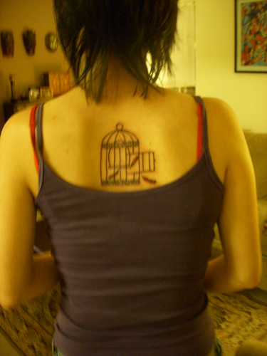 birdcage tattoo. irdcage tattoo