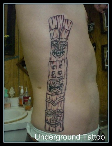 What the heck is this tattoo? No idea. Kinda totem, the only thing I am sure. Totem Pole Tattoo