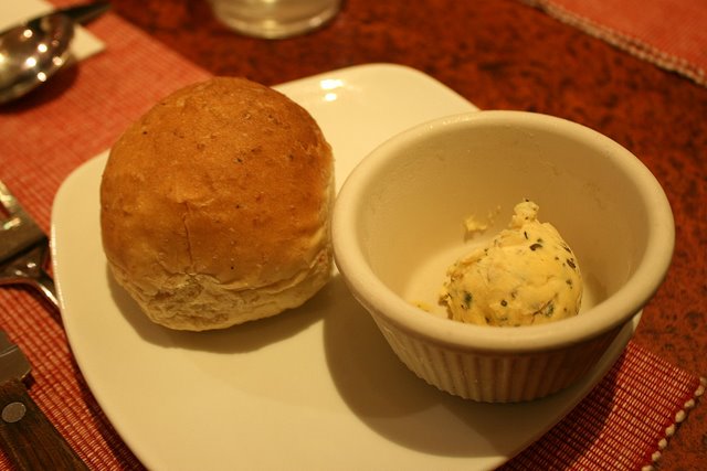 Complimentary warm bread with garlic herb butter