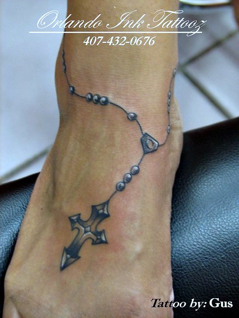 rosary tattoo foot. total free hand rosary every beed acounted for