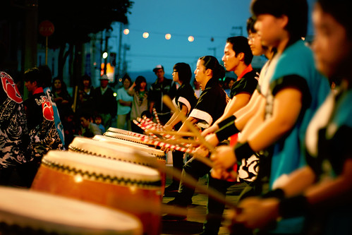 rolling thunder a <a href="http://en.wikipedia.org/wiki/Taiko" target="_blank">taiko</a> performance, at the <a href="http://en.wikipedia.org/wiki/Bon-odori " target="_blank">bon-odori</a> festival in Takikawa.  Try to imagine the power of 20 giant hardwood drums being struck at the exact same time... you can feel it deep down in your gut!  I could easily march into battle to the sound of these things...