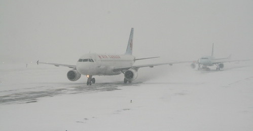 Airplanes Skidding In A Snow Storm