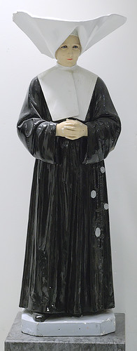 Statue of a nun, at Saint Catharine Labouré Roman Catholic School, in Sappington, Missouri, USA