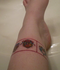 Flower tattoo bikini in foot.jpg