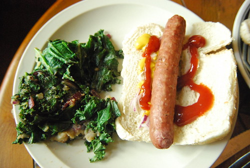farmer sausage "hot dog", wilted kale with potato