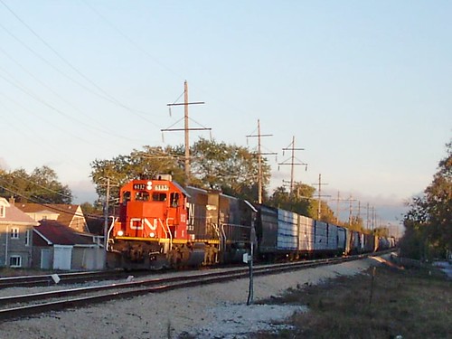 Westbound Canadian National freight train approaching the Riverside Drive railroad crossing. Berwyn Illinois. October 2007. by Eddie from Chicago