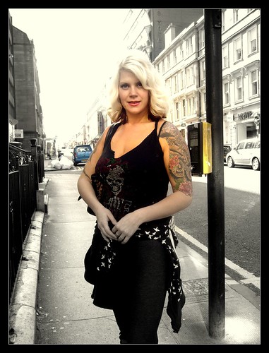 Sexy woman with tattoo : The statuesque tattooed blonde