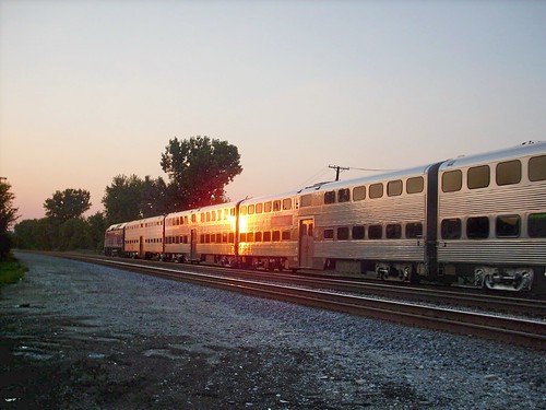 Westbound Metra passing through Elmwood Park Illinois at sunset. September 2007. by Eddie from Chicago