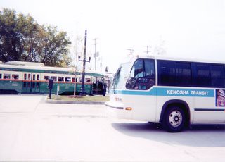 Kenosha Transit RTS bus and a refurbished 1951 PCC streetcar from the Toronto transit Commision. Kenosha Wisconsin. September 2000.