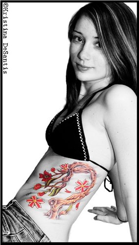 black and white cherry blossom side tattoo I am not the photographer 