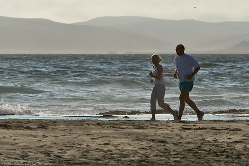 Father-daughter joggers on Morro Strand by mikebaird, on Flickr