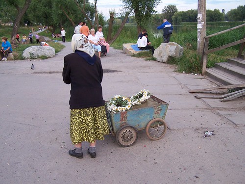 A Babucsya Selling Flower Wreaths for Ivana Kupala