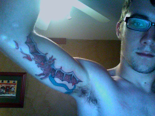 Bat_in_hand_Tattoo_Man.jpg,Skull_tattoo.jpg