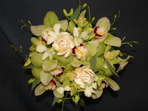 This pretty green and white bouquet will go well with you green and black 