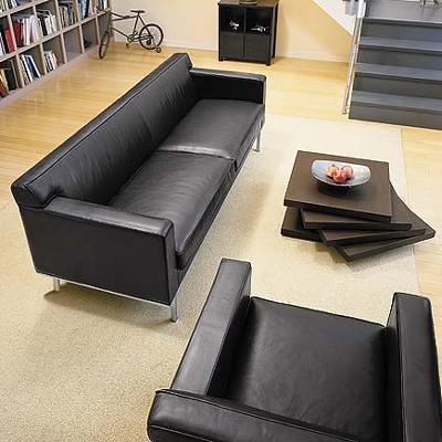 Unique Minimalist Living Room Design with unique table and black sofa
