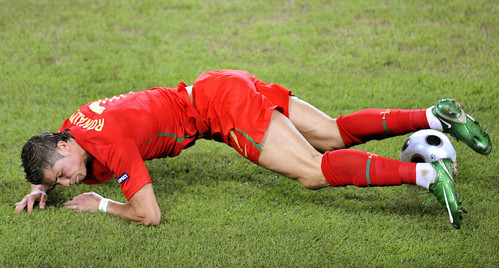 Cristiano Ronaldo falls during the Euro 2008 Championships quarter final match vs Germany