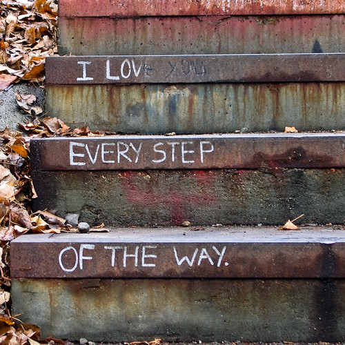 graffiti on stairs: I love you / every step / of the way