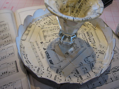 decoupage the sheet music in small pieces