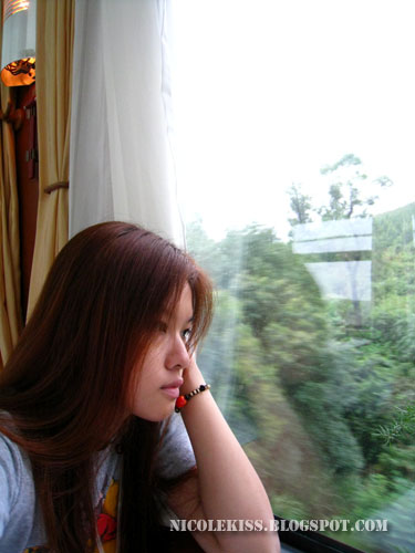 gazing out of window on train