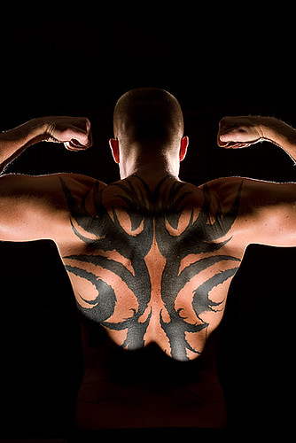 tribal strength tattoo
