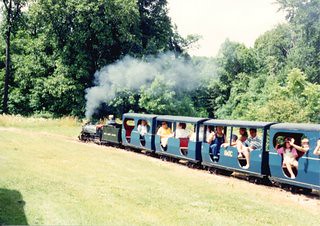 Speeding miniature 14 " guage live steam train. The Hesston Steam Museum. Hesston Indiana. June 1991. by Eddie from Chicago