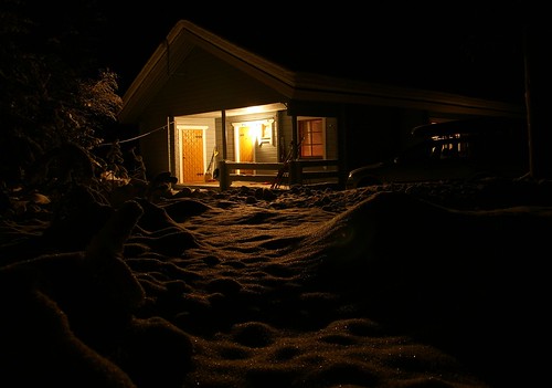 A cottage at night