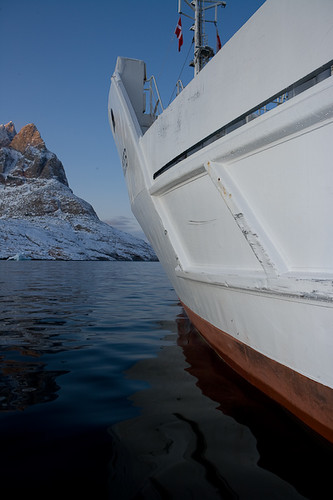 The Grigory Mikheev anchored in Uummannaq, Greenland