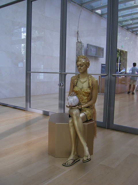 Model in gold body paint at the Nasher Sculpture