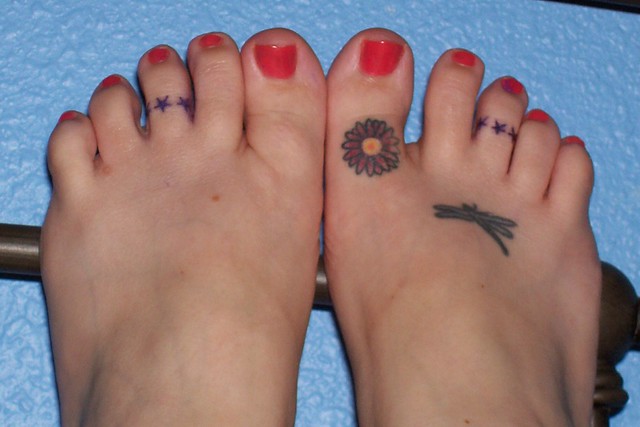 New toe ring tattoos.