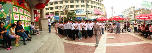 Morning outdoor briefing for supermarket staff in Shangnan, Shaanxi Province, China