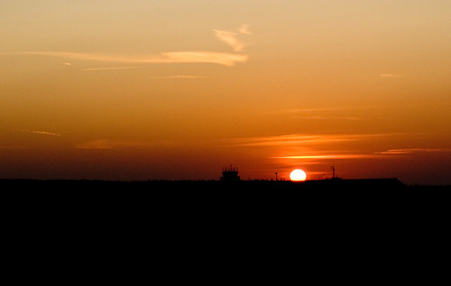 Sunset over the airport on Alderney by you.