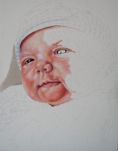 In progress photo of colored pencil drawing entitled Emre, Newborn