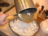 Quickly empty the popcorn into a bowl