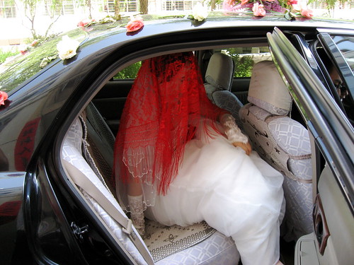 Bride getting down the car