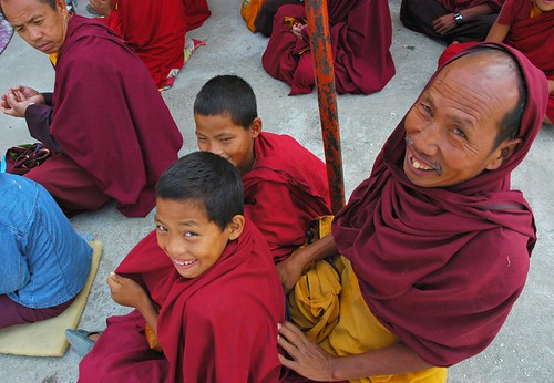 Tibetan Monks, looks like trouble! :-), young and old, during mandala offering, Tharlam Monastery Courtyard, Boudha, Kathmandu, Nepal by Wonderlane