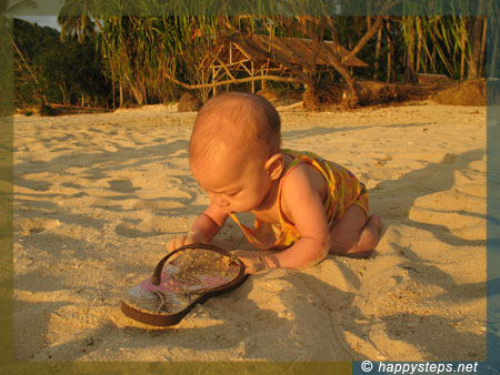 Baby Caite enjoying the sand at Punta Bulata