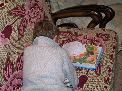 Maxime reading Bible stories