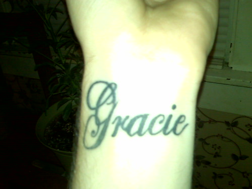 tattoos on wrist names. My daughters name Gracie on