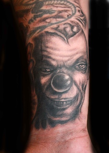 evil clown tattoos. scary clown