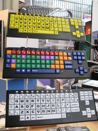 Assistive tech keyboards - three of them, all with large print and brightly contrasted colours