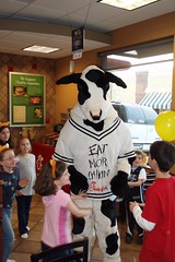 kids swarming the Chick-Fil-A cow