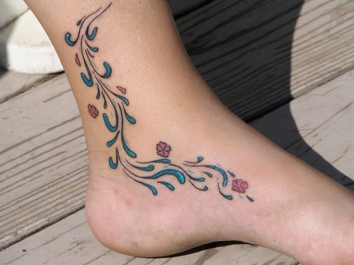 this is not tribal tattoo,it is art tattoo flowers design