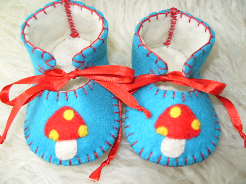 teal and cream baby booties with cute mushroom motifs-hand-stitched by Funky Shapes